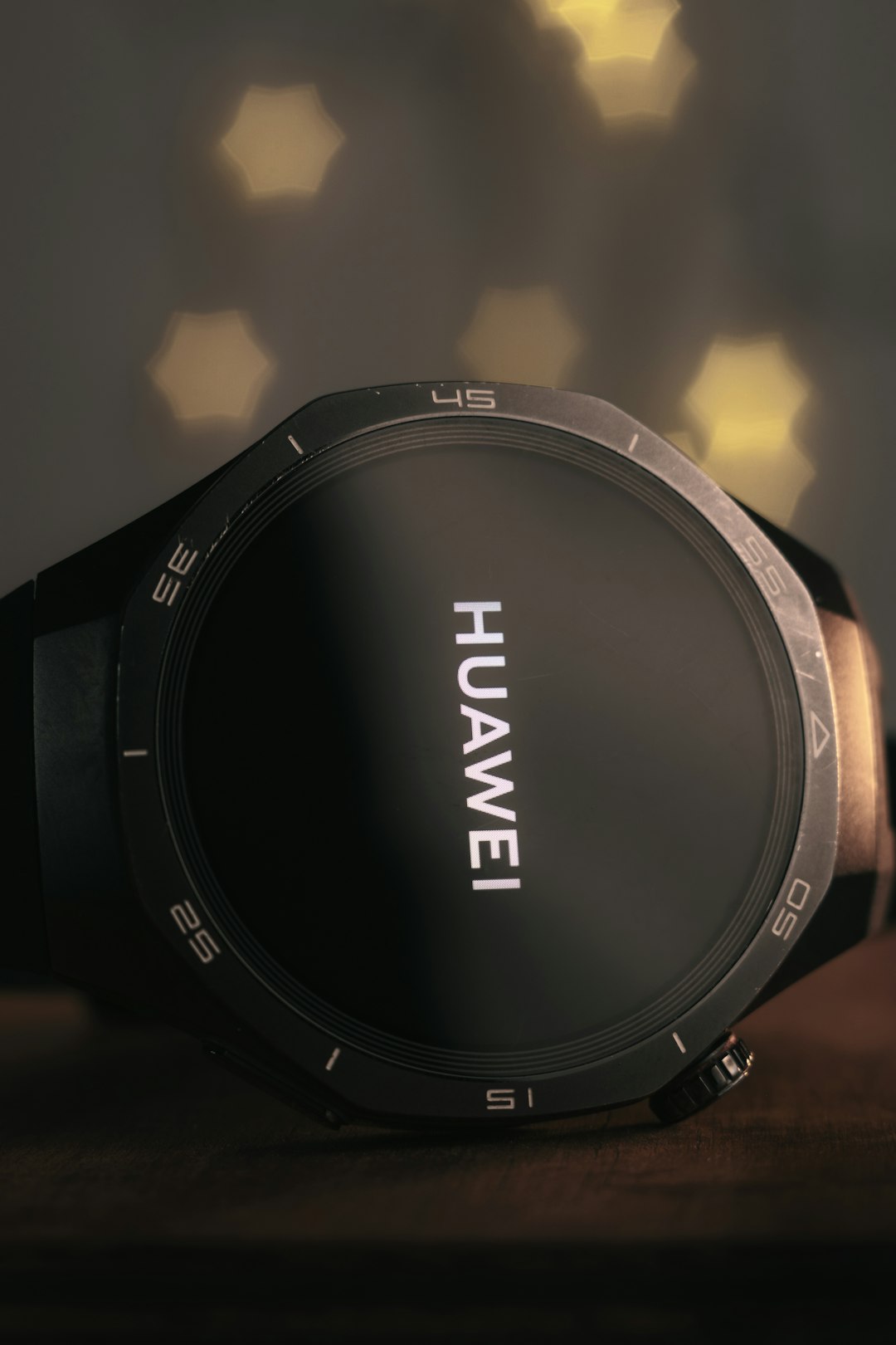 Huawei smartwatch with a black band and screen