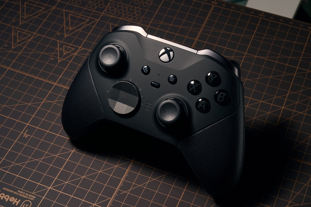 a close up of a controller on a table