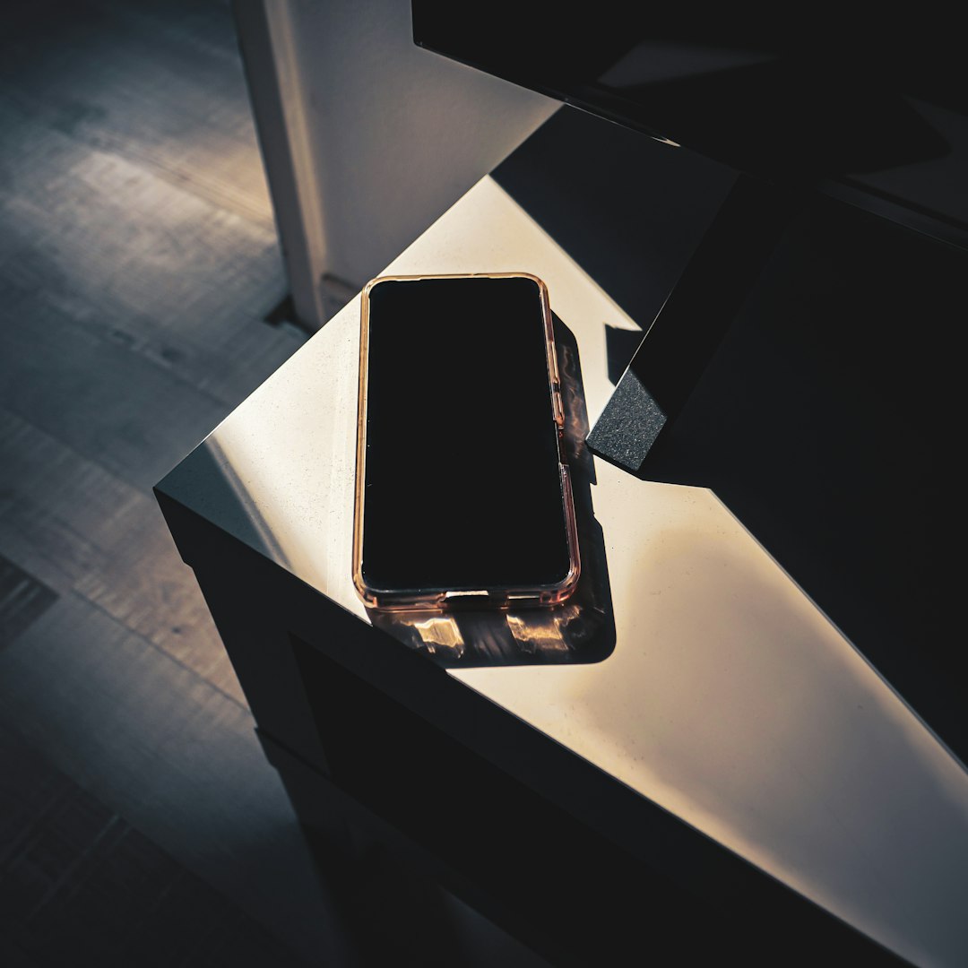 a cell phone sitting on top of a table