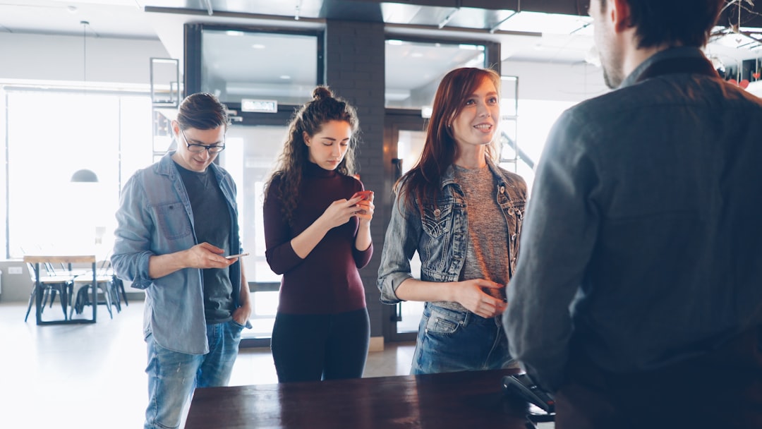 People appear to be interacting in a business setting.