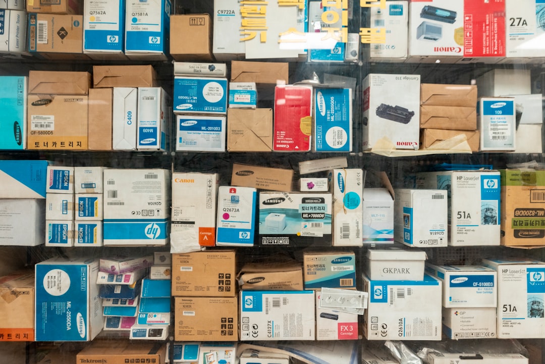 assorted boxes in shelves