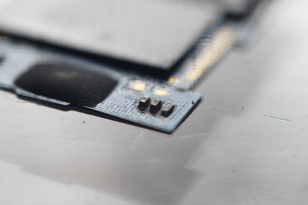 a close up of a cell phone's motherboard