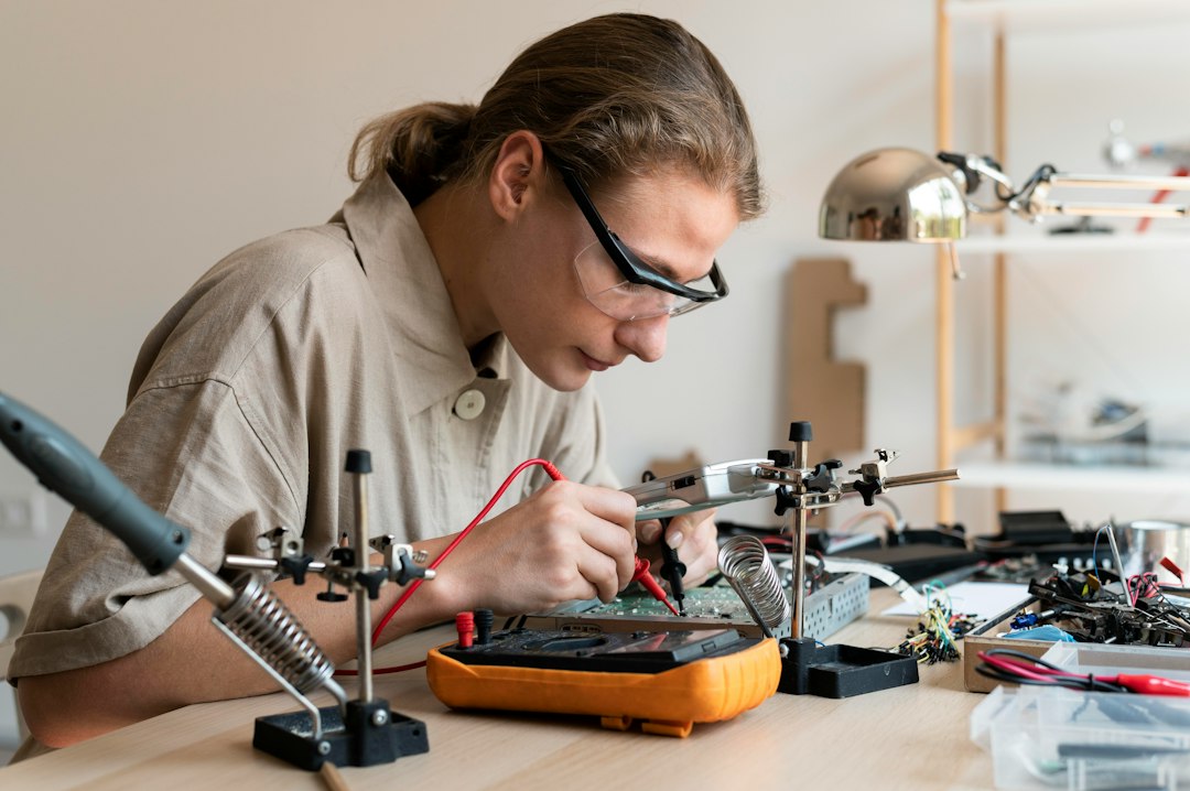 A technician is working on an electronic circuit